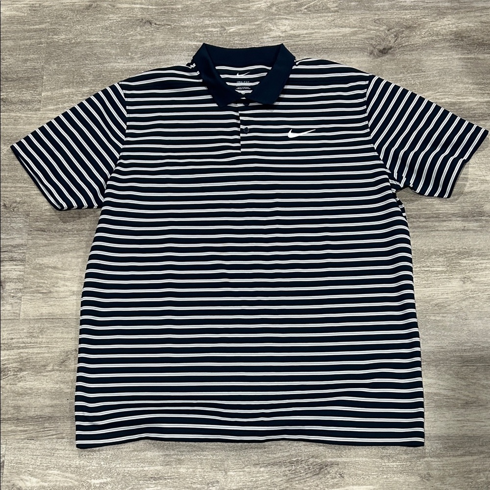 Nike Men's Navy and White Striped Polo Shirt slightly worn
